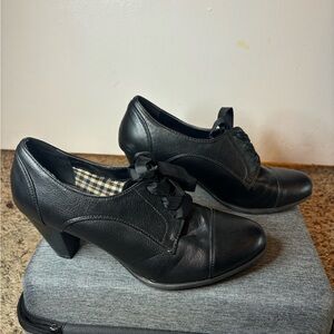 Black leather clog heels